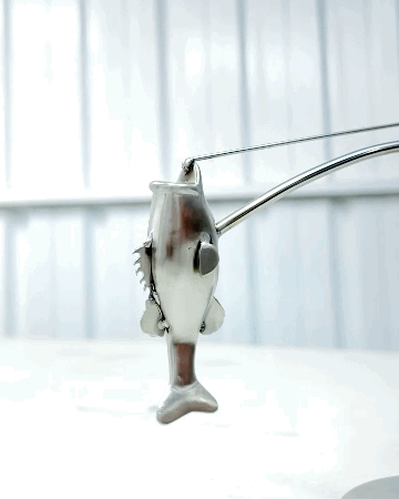 🎣Die balancierende Skulptur des Fischers